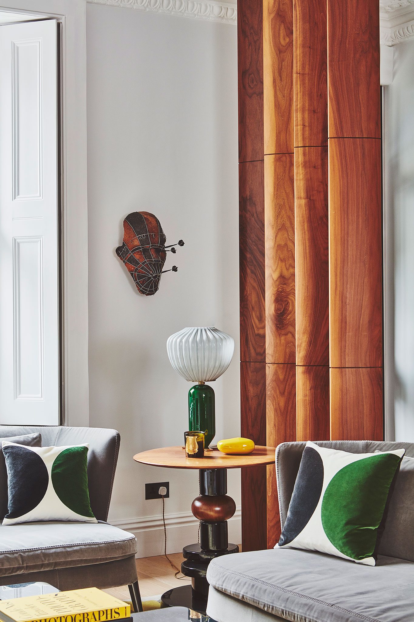 Sitting room with timber panelled wall