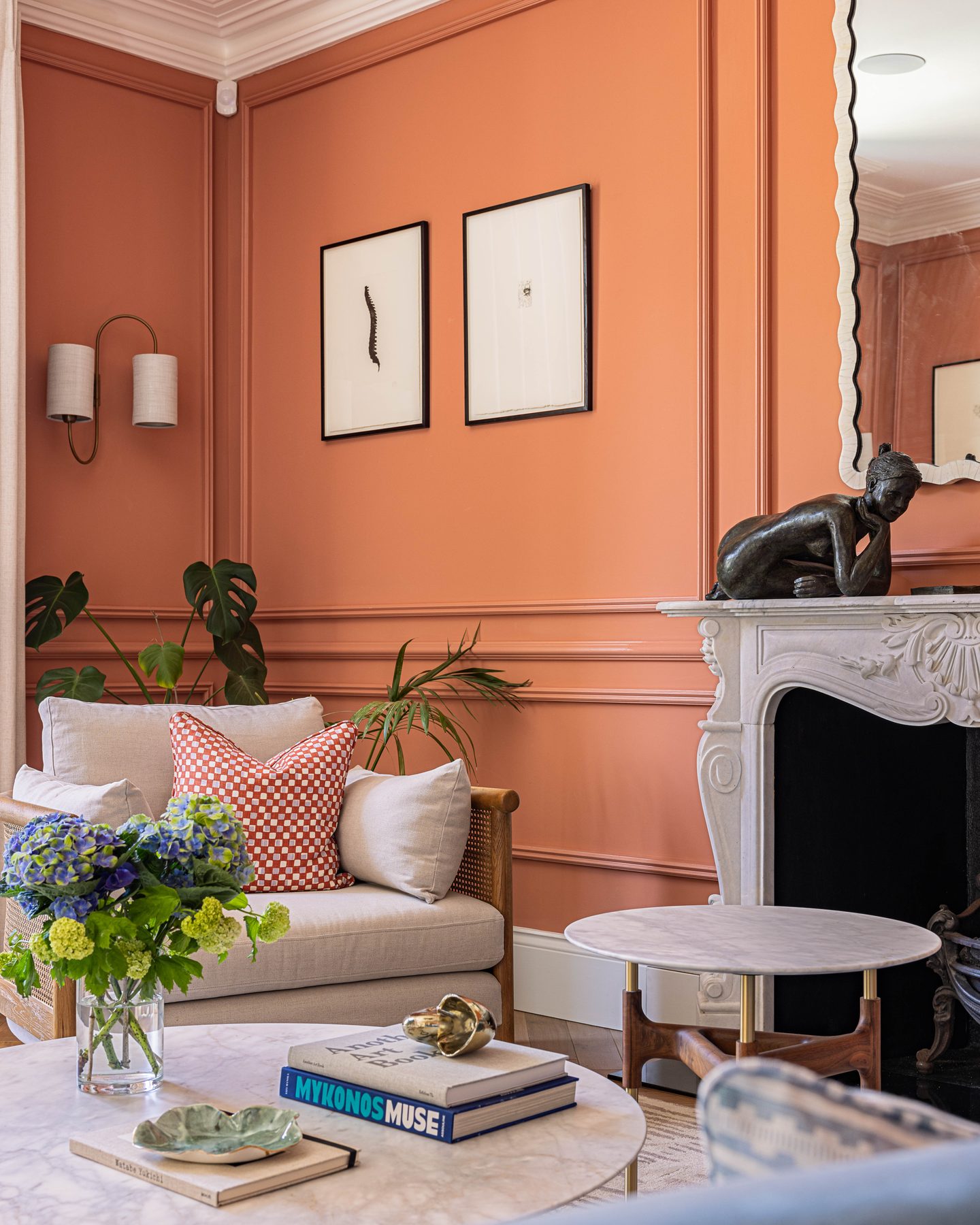 Drawing room in terracotta with marble fireplace