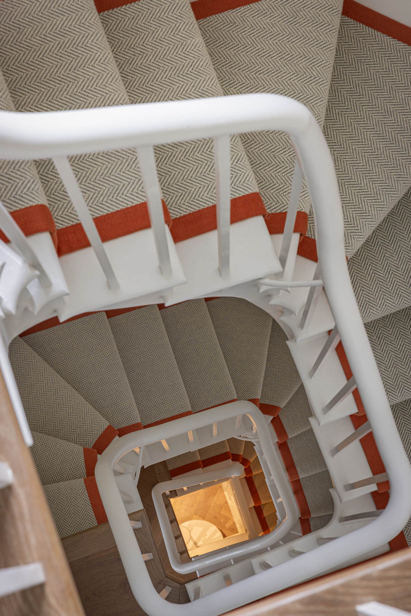 Stairwell seen from above, rising the full height of the house