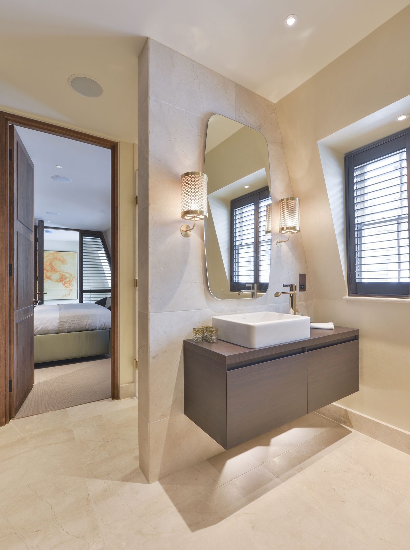 Bathroom with vessel basin, looking through to the bedroom