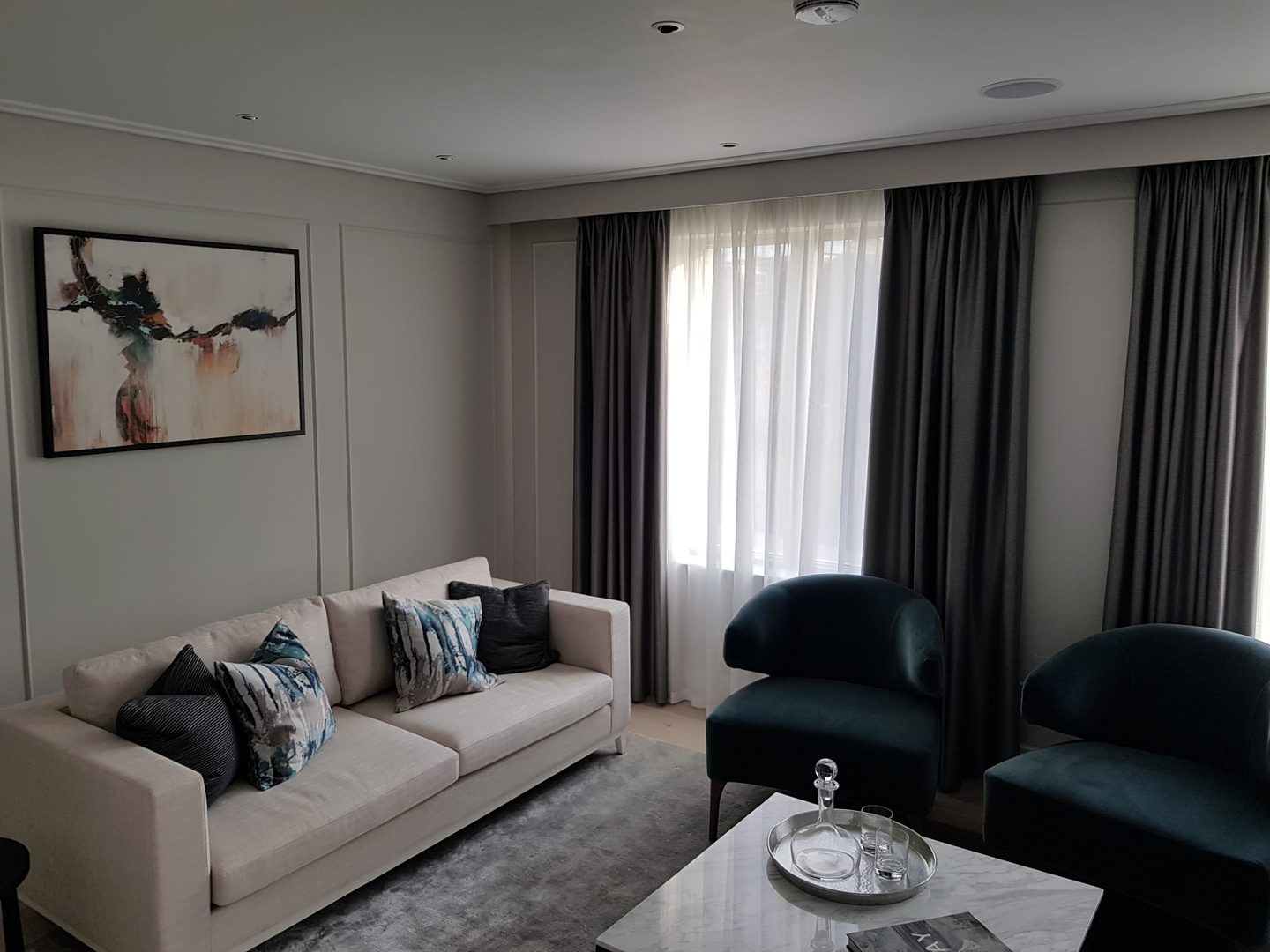 Living room with full-height curtains