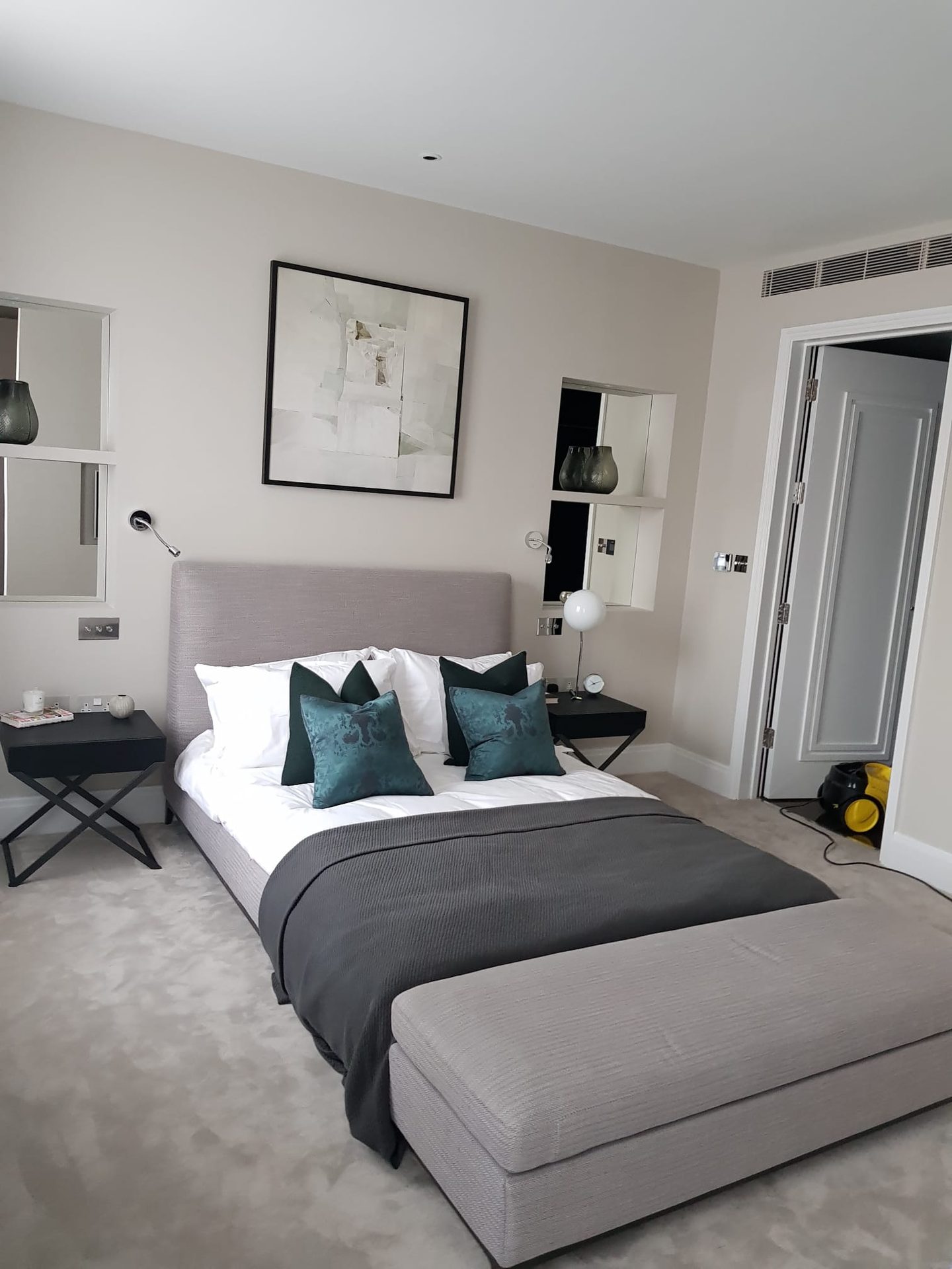 Bedroom with upholstered headboard